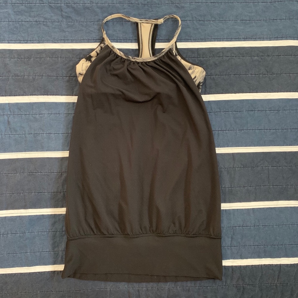 Gently used black and cream Lululemon No Limits